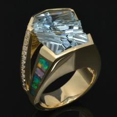 Australian opal ring with Munsteiner fantasy cut aquamarine accented with pave` set diamonds in 14k gold by Hileman.