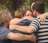 A devastated family holding each other after a tragic suicide in a Pinellas County home.