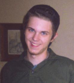 Colby's Army photo of Colby Keegan, age 20, smiling in a green shirt