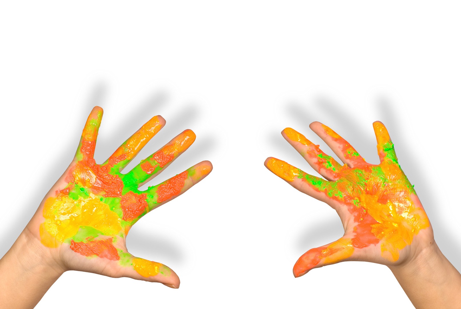 kid hands with a lot of colours