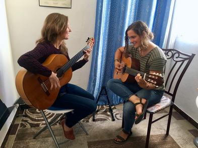 learning flamenco guitar rhythms in Seville