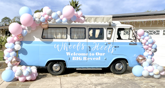 Gender reveal welcome sign wheels or heels balloon garland backdrop vintage van los angeles