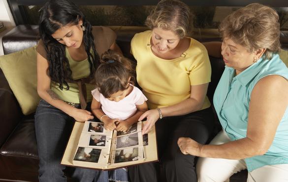 Women sharing family history with child