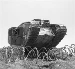 Tank going over trenches/barbed wire