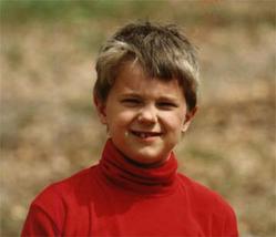 Colby's Army photo of Colby Keegan as a child in a red shirt