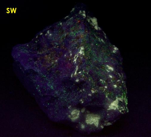 fluorescing FLUOBORITE, CHONDRODITE, PYRITE, CALCITE - Lime Crest Quarry (Lime Crest-Southdown Quarry), Sparta Township, Sussex County, New Jersey, USA