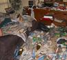 Trashed room representing our filthy home cleanup services in Pinellas County
