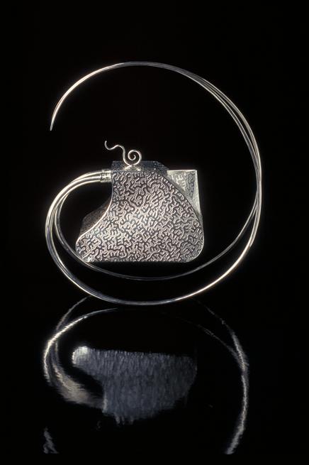 Engraved and hand fabricated sterling silver teapot by Irish metalsmith Kevin O'Dwyer