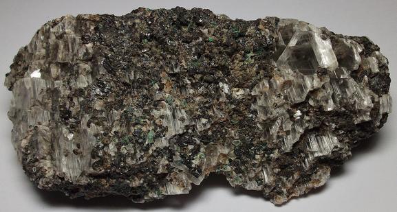 GYPSUM, MAGNETITE, fluorescent CALCITE, MALACHITE - Sterling Mine, Sterling Hill, Ogdensburg, Franklin Mining District, Sussex County, New Jersey, USA
