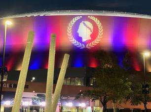 Dawn DeDeaux installs Milton's Paradise Lost on columns in front of the Caesar's Superdome in New Orleans