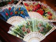 Hand fans that are perfect purse size for hot summer outings.
