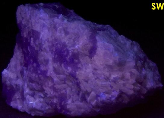 fluorescent phosphorescent white Wollastonite, blue Calcite- Gouverneur Talc Company No. 4 Quarry (Valentine deposit), Harrisville, Diana Township, Lewis County, New York