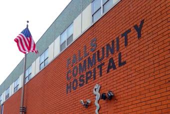 Front of FCHC hospital with flag