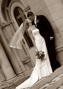 Newlyweds kiss on their wedding day at Gale Mansion in Minneapolis