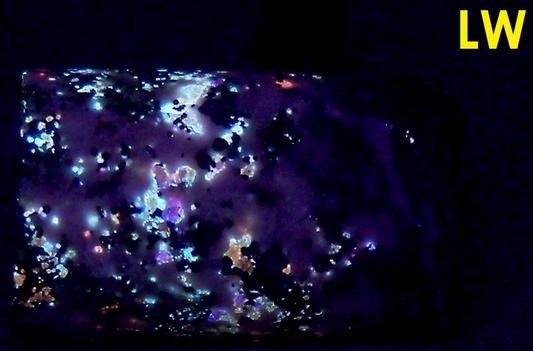 fluorescent phosphorescing Sphalerite Cleiophane, Willemite, Zincite, Franklinite, Magnetite, Calcite - Franklin, Franklin Mining District, Sussex County, New Jersey, USA