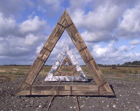 60 Degrees by Kevin O'Dwyer. The sculpture was fabricated from materials long associated with the industrial heritage of the cutaway bog - railway track, railway sleepers and steel plate.