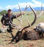 Whitetail deer hunter with bow