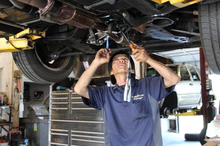 mechanic repairing vehicle