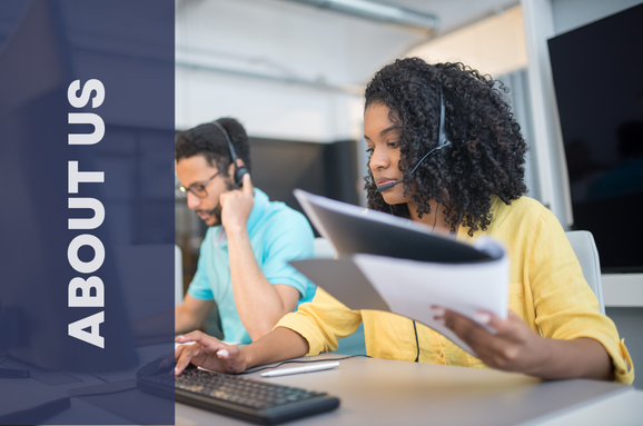 two customer service agents answering calls and working on their computer