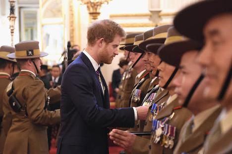 Gurkhas being awarded medals by HRH Prince Harry