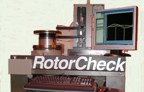 A Rotor Inspection System assembled and analyzing the surface of a component shown on digital display