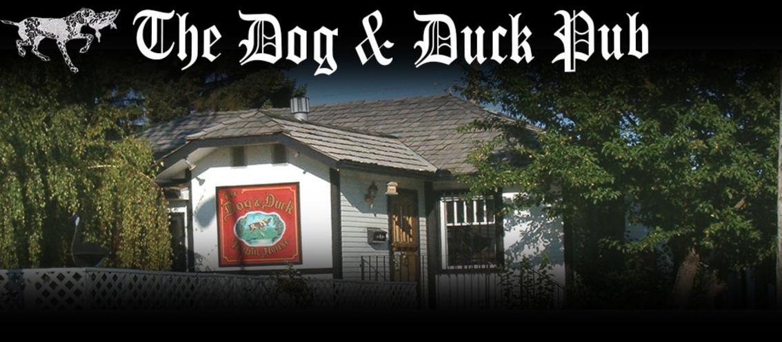 The Logo and Outside Picture of The Dog & Duck Pub and Restaurant in Calgary, located inside an Old White House, just like real British Pubs