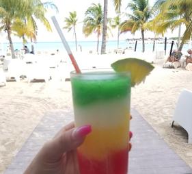 Cathy with Bob Marley Drink at RIU Palace Jamaica