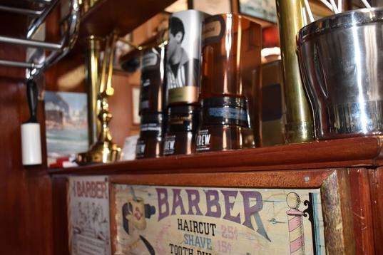 Hair products and barber sign.