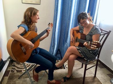 learning first flamenco guitar falseta in Seville