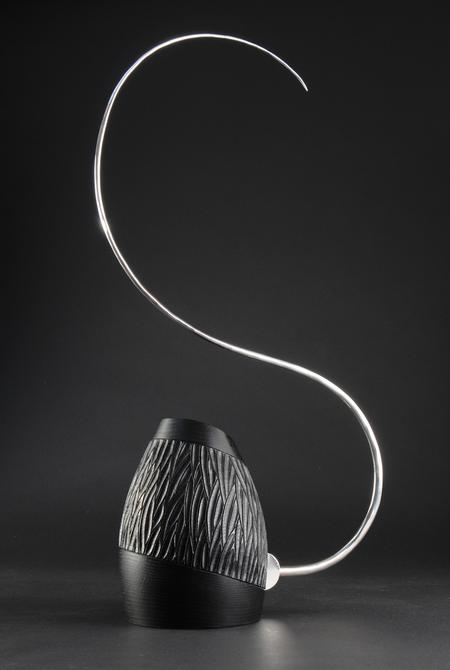 Ebonised oak and sterling silver vessel by Liam Flynn and Kevin O'Dwyer.