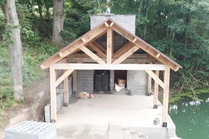 timber framed pavilion with chimney