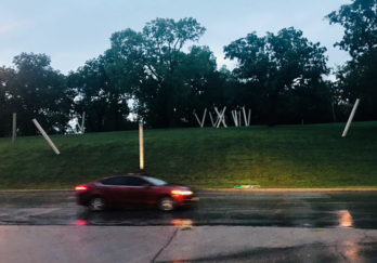 Dawn DeDeaux public sculpture FREE FALL making Milton's Darkness Visible in Highway Reflective Vinyl Text