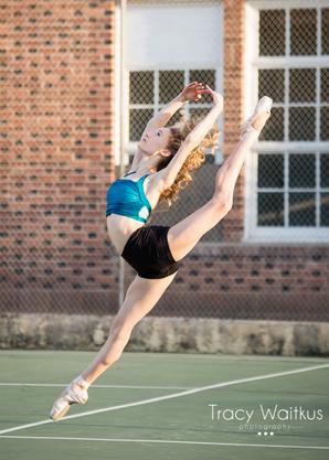 dancer leaping on a tennis court in Pismo Beach