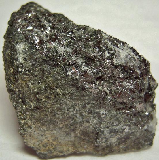 Graphite, fluorescent Meionite Scapolite, green pyroxene - Lead Hill Mines (Chilson Hill mine), Ticonderoga, Ticonderoga Township, Essex County, New York, USA