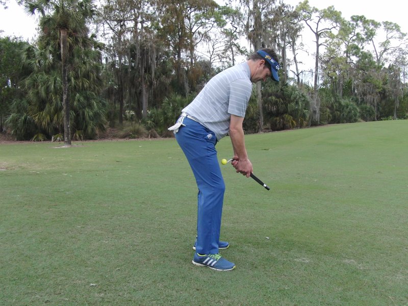 Impact snap golf club training aid Hank Haney