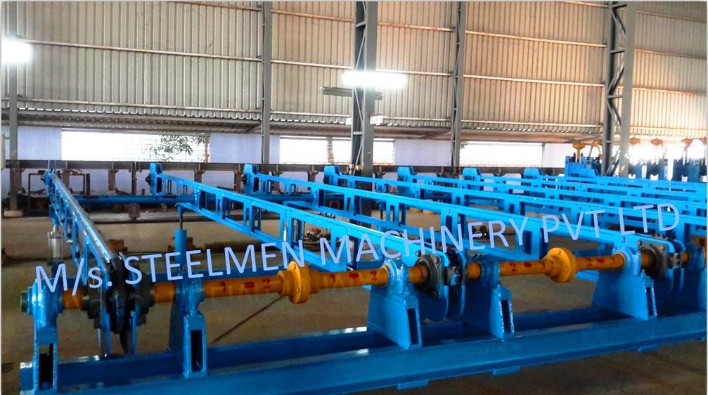 Y-TABLE FOR ROLLING MILLS, OIL LUBRICATION SYSTEM (Capacity - 50 LPM to 300 LPM), AUTOMATIC BUNDLING MACHINE, Hot Billet Shear, Billet Charging Grate, Flywheel, Gear Boxes, Mill Stands, Shearing Machines, Conveyor Rolls, Spindle Carrier, Pinch Rolls, Tilting Tables, Twin Channel, TMT Quenching System, Tail Breaker Pinch Rolls, Oil Lubrication System, Guide Box & Twist Pipes Mechanical Pusher, Mill Accessories, TMT Chain Transfer System, Recuperators, Cooling Tower, gear coupling, universal spindles, steel rolling mill, rolling mill items, steel plant machineries, steel plants, CCM, Continuous casting machine, steel melting, steel makers, leju Thomas, 9310524787, Gear boxes, Pinion stands, Rolling mill Stands on Fiber& bearings, Roller tables, Tilting tables, Y tables, Guide boxes, Chocks, Couplings, Spindles, Rotary shears, Flying shears, Cantilever type pinch Rolls, Tail Breaker pinch Rolls, Quenching Systems (for 8-16 mm, 16-25 mm, & 25-32 mm), Twin channel, Hot Rolling Mills, Shears, Automatic Cooling Bed, Quenching Boxes, Twin Channel Machine, Mill Stands, Cold Rolling Mills, Gear Couplings, Industrial Gear Box, Punching Cropping Machine, Hot Saw, Transmission Tower Machinery, Chain Transfer Systems, Product Design Development, Hot Rolling Mills Bar Rolling Mill Hot Rolling Mill Equipment Slit Rolling Mill Shears Flying Shear Crank Shear Continuous Rotating Shear Disc & Drum Shear Automatic Cooling Bed Quenching Boxes TMT Quenching Boxes Twin Channel Machine Industrial Gear Box Helical Gear Box Rolling Mill Gear Boxes Mill Stands Rolling Mill Stands TMT Mill Stands Housingless Mill Stands Cold Rolling Mills Gear Couplings Gear Jobwork Punching Cropping Machine Hot Saw Traveling type Hot Saw Fixed type Hot Saw Transmission Tower Machinery Chain Transfer Systems Product Design Development, Turnkey Solutions For Hot Rolling Mills Coilers Mill stands Shears & hot saws Twin channel Cooling beds Gear boxes & pinion stands TMT Equipment, Rolling Mill Machines Blade Grinding Machine Hot Saw Machines Straightening Machine Hydraulic Pusher, Hydraulic Cylinders, Ejectors, Hot Rolling Mill Flywheels Gear Boxes Mill Stands Gear Couplings Material Handling Equipment TMT Equipment Cooling Bed Shearing Machines Straightening Machines Spare Parts Of Rolling Mills Other Allied Equipments Bending & Time Machine Workshop Machinery, ♦ Bar Mills ♦ Structural Steel Mill Wire Rod Mill with Bar in Coil Line Rolling Mill for High-Grade Steels Section Mill High Speed Laying Head with Gear Box Crank Lever Shears Crank Shears Housingless Stands Double Crank Shears Rake Type Cooling Conventional Mill Stands Gear Boxes Rod mill block Varioblock Flying Shear • Tail Braking Pinch Roll • Cold Shear, Starting Stock Billets 160 x 160 x 12,000 mm 130 x 130 x 12,000 mm Furnace Group Charging grate, Hot charging, Elevator, Induction online heater Finished product Rebar 8 three-strand slit TMT Rebar 10 two-strand slit TMT Rebar 12-40 mm TMT Flats, angles and channels are possible too Sub-bundles 100-400 kg Master bundles 1 MT-3 MT Furnace Capacity 80 MT/h Main train Single-strand H/V arrangement, two strands are H/V type Roughing train : 4 off Model 600, 2 off Model 440, Free outlet after stand # 2 Intermediate train : 4 off Model 440, 4 off Model 340 Finishing train : 6 x Model 340 Associated shears Loopers : 8 off vertical, 6 off Single strand, 2 off multi strand Capacity 400,000 MT/y Cooling bed group Water quenching line, Thermex Cooling bed shear Cooling bed 66 x 10 m Finished speed 16 m/s (20 m/s) Material grades Carbon steels, Alloyed Structural Steel grades Continuous finishing shop Stationary cold shear 3,000 kN Counting system Small bundle forming 4 off Tying machine Various associated equipment, e.g. stoppers, chain transfers, roller tables, Starting stock Blooms 180 x 180 x 8,000 - 12,000 mm 300 x 300 x 8,000 - 12,000 mm Finished product Rebars 28 - 40 mm Rounds 30 - 100 mm dia. Hexagons 50 - 80 mm Flats 8 x 30 - 60 x 150 H-Beams 100 - 180 mm I-Beams 100 - 200 mm T-sections 75 - 140 mm Channels 100 - 200 mm Angles 80 x 80 x - 200 x 200 mm U-type sections for mine timbering 18U, 25U,29U Bundle/stack length 6 - 24 m Bundle/stack weight 2 - 5 t Furnace capacity 116/143 t/h Annual capacity 700,000 t/y Finishing speeds 6 m/s Material grades Carbon steels, Alloyed structural steel,Antifriction bearing steel Furnace group: Elevator (for hot charging), charging grate,weighscale, descaler, insulated holding tunnel Mill train: Single strand Roughing train 4 x Model 670, 1 x Model 760(V-H-HV-H) Intermediate train: 2 x Model 760, 4 x Model 670(H-H-H-UR-UR-HV) Finishing train: 5 x Model 670 (UR-HV-UR-HV-FUR) Associated shears Loopers: 4 x vertical Cooling bed group: Water cooling line, pinch roll unit Cooling bed shear Cooling bed 84 x 19 m Short-bar collecting device Continuous finishing shop In-line straightening machine (10 rollers) Hot saws: 1 x stationary, 1 x movable Abrasive cutting machines: 1 x fixed, 1 x movable Piling and stacking facilities (magnet-type) Tying machines: 2 x stationary, 2 x movable Various associated equipment, e.g. stoppers, chain transfers, roller tables. upto 150 x 150 x 12,000 mm Finished product: Wire rod 5.5 - 16 mm Rebars Nos. 3, 4 and 5 (as per ASTM) Coils 16 - 42 mm dia. Furnace capacity: 70 t/h Annual capacity: 300,000 t/y Finishing speeds: Wire rod line - 100 (120) m/s Bar in coil line - 13.5 m/s Material grades: Cold-heading steels Reinforcing steels Steels with a carbon content from low to medium Piano-wire PC-wire Free-cutting steel Water cooling line, pinch roll units, bar reels (2x), coil transfer,chain conveyor with retarded and accelerated cooling facilities, transfer unit to Power & Free coil handling system, Starting stock Billets 50 x 100 x 10,000 mm 125 x 125 x 11,400 mm Finished product Rod 5.5 - 13.5 mm dia. Bars 11 - 57 mm dia. Flads 22 - 120 mm, 5 - 12 mm thick Bundle/stack length 3 - 8.5 m Bundle/stack weight 0.5 - 3 (5) t Furnace capacity up to 60 t/h Material grades High-grade structural steels 34 Cr 4, 60 SiMn7, 42 CrMo4 Antifriction bearing steels 100 Cr 6, 100 Cr 2, 100 CrMo 7 3 Material grades Tool steels X 210 Cr 12, X 38 CrMoV 5 1, 55 CrNiMoVS 4 2 4 Acid-resistant and heat-resistant steels X 5 CrNiMo 18 11, X 2 CrNiMo 19 13,X 20 CrNiSi 25 4 High-speed steels X 79 Wco 18 5, X 82 W Mo 6 5 5 Special alloys X 55 CrMnNiN 20 8,X 45 CrSi 9 3 X 3 CrNiMoNbN 23 17 The complete range of steel grades includes approx. 300 different grades Furnace group: Charging grate, cross transfers, weighscale, descaler (2x), heatholding tunnel Mill train: Single strand, H/V - arrangement Roughing train: PSW and 6 x Model 440 Intermediate train: 4 x Model 440, 2 x Model 340 Finishing train: 4 x Model 340 Kocks-block 8-stand wire rod block for high grade steels 3 x 215/ 5 x 170 Associated shears Loopers: 7 x vertical, 1 x horizontal Cooling bed group: Water cooling line, pinch roll unit Cooling bed shear Cooling bed 57 x 5 m Continuous finishing shop: Abrasive cutting machine Piling and stacking facilities (non-magnet type) Tying machines: 1 x fi xed, 1 x movable various associated equipment, e.g. stoppers, chain transfers, roller tables etc. Rod finishing equipment: Water cooling and equalizing sections, pinch roll unit,laying head Ring conveyor for retarded and accelerated cooling reforming tub Pallet-type coil handling system, compacting & tying units,weighscale, unloading station Reel plant Water cooling and equalizing sections, Pinch roll units, Bar reels: 2 x, Transfer equipment to pallet-type coil handling system, Omsairam Steel & Alloys Pvt. Ltd., Bhagyalaxml Rolling Mills Pvt. Ltd., Kalika Re-rollers Pvt. Ltd., Parvati Alloys (P) Ltd., MITC Rolling Mills (P) Ltd., Maharashtra Steel Rolling & Engg Co. Chimanlal Vijay Kumar Steels Pvt. Ltd, Bhagwati Ferro Metals (P) Ltd, Balbir Rolling Mills Ltd. Quartz Metals Inds., Metro Alloys Ltd., Pushpak Steel Inds. Pvt Ltd., T. k. Ispat Pvt Ltd., Allied Ferromelt Pvt Ltd., Bhagwati Steel Cast Ltd., R. L. Steels Ltd., Guardian Steels Pvt. Ltd., Shri Karvir Nivasini Mahalakshmi Ispat Pvt. Ltd., Khatu Shyamji Steel Rolling Mills Pvt. Ltd., Kunal Ispat & Alloy Inds. Pvt Ltd. Sun Metallics & Alloys Pvt. Ltd, Hans Ispat Ltd. Shri Khatu Shyam Industries, Rajuri Steel Pvt. Ltd, Shree Om Steel Rolling, Air Carrying Corpn (I) Ltd., titan Alloys Ltd. Sunflag Iron & Steel Co. Ltd., Sharda Ispat Ltd., Fortune Metaliks Ltd., Sharda Shree Ispat Ltd., R. K. Structures Pvt. Ltd., Sanvijay Industries Pvt. Ltd., Shivali Udyog (I) Ltd., S.D. Bansal Iron & Steel Pvt. Ltd., Inertia Iron & Steel Inds. Pvt. Ltd., Nalwa Steel & Power Ltd., Shilpa Re-rollers Ltd., Sri Jai Balaj Steel Rolling Mills Ltd., Petropol India Ltd. Galwalia Ispat Udyog Pvt. Ltd. Crest Steel & Power Pvt. Ltd. Himalayan Rolling Steel Industries Pvt. Ltd., Shree Balaji Pigments Pvt. Ltd., Upper India Steel Mfg. & Engg. Co. Ltd., Capital Ispat Ltd., Barnala Steels Inds. Ltd., Shri S.S. Shyam Steels Pvt. Ltd. Fortune Metals Ltd. Rathi Udyog Ltd., M/s. Gallantt Ispat Lyd., Gemini Merchandise Pvt. Ltd., Jagdamba Rolling Mills, Shree Krishna Steel Rolling (Jaipur) Ltd. Modi Steels, Usha Martin Inds. Prince TMT Steels Pvt. Ltd., Dindigul Iron & Steel Co (P) Ltd. ARS Metals Ltd. V.V. Iron & Steel Company Pvt Ltd. Jairaj Ispat Ltd., Pioneer Torsteel Mills (P) Ltd., Devshree Ispat Pvt. Ltd., Vaibhav Merchantile Ltd., Maa Mahamaya Inds. Pvt. Ltd., Chitrakoot Metal Ltd. P. R. Rolling Mills Pvt. Ltd. Shree Aravindh Steels Ltd. Shyam Steel Industries Ltd. Shri Ramrupai Balaji Steels Ltd. Adhunik Ispat Pvt. Ltd. Durgapur Steels Ltd. B. M. A. Stainless Ltd. Zion Steel Ltd. Shree Metaliks Ltd. Usha Martin Ltd. Shyam Sel Ltd. Maithan Steel & Power Ltd.