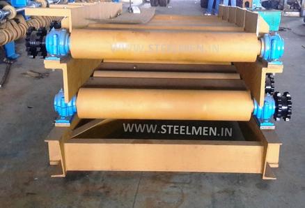 Y-TABLE FOR ROLLING MILLS, OIL LUBRICATION SYSTEM (Capacity - 50 LPM to 300 LPM), AUTOMATIC BUNDLING MACHINE, Hot Billet Shear, Billet Charging Grate, Flywheel, Gear Boxes, Mill Stands, Shearing Machines, Conveyor Rolls, Spindle Carrier, Pinch Rolls, Tilting Tables, Twin Channel, TMT Quenching System, Tail Breaker Pinch Rolls, Oil Lubrication System, Guide Box & Twist Pipes Mechanical Pusher, Mill Accessories, TMT Chain Transfer System, Recuperators, Cooling Tower, gear coupling, universal spindles, steel rolling mill, rolling mill items, steel plant machineries, steel plants, CCM, Continuous casting machine, steel melting, steel makers, leju Thomas, 9310524787, Gear boxes, Pinion stands, Rolling mill Stands on Fiber& bearings, Roller tables, Tilting tables, Y tables, Guide boxes, Chocks, Couplings, Spindles, Rotary shears, Flying shears, Cantilever type pinch Rolls, Tail Breaker pinch Rolls, Quenching Systems (for 8-16 mm, 16-25 mm, & 25-32 mm), Twin channel, Hot Rolling Mills, Shears, Automatic Cooling Bed, Quenching Boxes, Twin Channel Machine, Mill Stands, Cold Rolling Mills, Gear Couplings, Industrial Gear Box, Punching Cropping Machine, Hot Saw, Transmission Tower Machinery, Chain Transfer Systems, Product Design Development, Hot Rolling Mills Bar Rolling Mill Hot Rolling Mill Equipment Slit Rolling Mill Shears Flying Shear Crank Shear Continuous Rotating Shear Disc & Drum Shear Automatic Cooling Bed Quenching Boxes TMT Quenching Boxes Twin Channel Machine Industrial Gear Box Helical Gear Box Rolling Mill Gear Boxes Mill Stands Rolling Mill Stands TMT Mill Stands Housingless Mill Stands Cold Rolling Mills Gear Couplings Gear Jobwork Punching Cropping Machine Hot Saw Traveling type Hot Saw Fixed type Hot Saw Transmission Tower Machinery Chain Transfer Systems Product Design Development, Turnkey Solutions For Hot Rolling Mills Coilers Mill stands Shears & hot saws Twin channel Cooling beds Gear boxes & pinion stands TMT Equipment, Rolling Mill Machines Blade Grinding Machine Hot Saw Machines Straightening Machine Hydraulic Pusher, Hydraulic Cylinders, Ejectors, Hot Rolling Mill Flywheels Gear Boxes Mill Stands Gear Couplings Material Handling Equipment TMT Equipment Cooling Bed Shearing Machines Straightening Machines Spare Parts Of Rolling Mills Other Allied Equipments Bending & Time Machine Workshop Machinery, ♦ Bar Mills ♦ Structural Steel Mill Wire Rod Mill with Bar in Coil Line Rolling Mill for High-Grade Steels Section Mill High Speed Laying Head with Gear Box Crank Lever Shears Crank Shears Housingless Stands Double Crank Shears Rake Type Cooling Conventional Mill Stands Gear Boxes Rod mill block Varioblock Flying Shear • Tail Braking Pinch Roll • Cold Shear, Starting Stock Billets 160 x 160 x 12,000 mm 130 x 130 x 12,000 mm Furnace Group Charging grate, Hot charging, Elevator, Induction online heater Finished product Rebar 8 three-strand slit TMT Rebar 10 two-strand slit TMT Rebar 12-40 mm TMT Flats, angles and channels are possible too Sub-bundles 100-400 kg Master bundles 1 MT-3 MT Furnace Capacity 80 MT/h Main train Single-strand H/V arrangement, two strands are H/V type Roughing train : 4 off Model 600, 2 off Model 440, Free outlet after stand # 2 Intermediate train : 4 off Model 440, 4 off Model 340 Finishing train : 6 x Model 340 Associated shears Loopers : 8 off vertical, 6 off Single strand, 2 off multi strand Capacity 400,000 MT/y Cooling bed group Water quenching line, Thermex Cooling bed shear Cooling bed 66 x 10 m Finished speed 16 m/s (20 m/s) Material grades Carbon steels, Alloyed Structural Steel grades Continuous finishing shop Stationary cold shear 3,000 kN Counting system Small bundle forming 4 off Tying machine Various associated equipment, e.g. stoppers, chain transfers, roller tables, Starting stock Blooms 180 x 180 x 8,000 - 12,000 mm 300 x 300 x 8,000 - 12,000 mm Finished product Rebars 28 - 40 mm Rounds 30 - 100 mm dia. Hexagons 50 - 80 mm Flats 8 x 30 - 60 x 150 H-Beams 100 - 180 mm I-Beams 100 - 200 mm T-sections 75 - 140 mm Channels 100 - 200 mm Angles 80 x 80 x - 200 x 200 mm U-type sections for mine timbering 18U, 25U,29U Bundle/stack length 6 - 24 m Bundle/stack weight 2 - 5 t Furnace capacity 116/143 t/h Annual capacity 700,000 t/y Finishing speeds 6 m/s Material grades Carbon steels, Alloyed structural steel,Antifriction bearing steel Furnace group: Elevator (for hot charging), charging grate,weighscale, descaler, insulated holding tunnel Mill train: Single strand Roughing train 4 x Model 670, 1 x Model 760(V-H-HV-H) Intermediate train: 2 x Model 760, 4 x Model 670(H-H-H-UR-UR-HV) Finishing train: 5 x Model 670 (UR-HV-UR-HV-FUR) Associated shears Loopers: 4 x vertical Cooling bed group: Water cooling line, pinch roll unit Cooling bed shear Cooling bed 84 x 19 m Short-bar collecting device Continuous finishing shop In-line straightening machine (10 rollers) Hot saws: 1 x stationary, 1 x movable Abrasive cutting machines: 1 x fixed, 1 x movable Piling and stacking facilities (magnet-type) Tying machines: 2 x stationary, 2 x movable Various associated equipment, e.g. stoppers, chain transfers, roller tables. upto 150 x 150 x 12,000 mm Finished product: Wire rod 5.5 - 16 mm Rebars Nos. 3, 4 and 5 (as per ASTM) Coils 16 - 42 mm dia. Furnace capacity: 70 t/h Annual capacity: 300,000 t/y Finishing speeds: Wire rod line - 100 (120) m/s Bar in coil line - 13.5 m/s Material grades: Cold-heading steels Reinforcing steels Steels with a carbon content from low to medium Piano-wire PC-wire Free-cutting steel Water cooling line, pinch roll units, bar reels (2x), coil transfer,chain conveyor with retarded and accelerated cooling facilities, transfer unit to Power & Free coil handling system, Starting stock Billets 50 x 100 x 10,000 mm 125 x 125 x 11,400 mm Finished product Rod 5.5 - 13.5 mm dia. Bars 11 - 57 mm dia. Flads 22 - 120 mm, 5 - 12 mm thick Bundle/stack length 3 - 8.5 m Bundle/stack weight 0.5 - 3 (5) t Furnace capacity up to 60 t/h Material grades High-grade structural steels 34 Cr 4, 60 SiMn7, 42 CrMo4 Antifriction bearing steels 100 Cr 6, 100 Cr 2, 100 CrMo 7 3 Material grades Tool steels X 210 Cr 12, X 38 CrMoV 5 1, 55 CrNiMoVS 4 2 4 Acid-resistant and heat-resistant steels X 5 CrNiMo 18 11, X 2 CrNiMo 19 13,X 20 CrNiSi 25 4 High-speed steels X 79 Wco 18 5, X 82 W Mo 6 5 5 Special alloys X 55 CrMnNiN 20 8,X 45 CrSi 9 3 X 3 CrNiMoNbN 23 17 The complete range of steel grades includes approx. 300 different grades Furnace group: Charging grate, cross transfers, weighscale, descaler (2x), heatholding tunnel Mill train: Single strand, H/V - arrangement Roughing train: PSW and 6 x Model 440 Intermediate train: 4 x Model 440, 2 x Model 340 Finishing train: 4 x Model 340 Kocks-block 8-stand wire rod block for high grade steels 3 x 215/ 5 x 170 Associated shears Loopers: 7 x vertical, 1 x horizontal Cooling bed group: Water cooling line, pinch roll unit Cooling bed shear Cooling bed 57 x 5 m Continuous finishing shop: Abrasive cutting machine Piling and stacking facilities (non-magnet type) Tying machines: 1 x fi xed, 1 x movable various associated equipment, e.g. stoppers, chain transfers, roller tables etc. Rod finishing equipment: Water cooling and equalizing sections, pinch roll unit,laying head Ring conveyor for retarded and accelerated cooling reforming tub Pallet-type coil handling system, compacting & tying units,weighscale, unloading station Reel plant Water cooling and equalizing sections, Pinch roll units, Bar reels: 2 x, Transfer equipment to pallet-type coil handling system, Omsairam Steel & Alloys Pvt. Ltd., Bhagyalaxml Rolling Mills Pvt. Ltd., Kalika Re-rollers Pvt. Ltd., Parvati Alloys (P) Ltd., MITC Rolling Mills (P) Ltd., Maharashtra Steel Rolling & Engg Co. Chimanlal Vijay Kumar Steels Pvt. Ltd, Bhagwati Ferro Metals (P) Ltd, Balbir Rolling Mills Ltd. Quartz Metals Inds., Metro Alloys Ltd., Pushpak Steel Inds. Pvt Ltd., T. k. Ispat Pvt Ltd., Allied Ferromelt Pvt Ltd., Bhagwati Steel Cast Ltd., R. L. Steels Ltd., Guardian Steels Pvt. Ltd., Shri Karvir Nivasini Mahalakshmi Ispat Pvt. Ltd., Khatu Shyamji Steel Rolling Mills Pvt. Ltd., Kunal Ispat & Alloy Inds. Pvt Ltd. Sun Metallics & Alloys Pvt. Ltd, Hans Ispat Ltd. Shri Khatu Shyam Industries, Rajuri Steel Pvt. Ltd, Shree Om Steel Rolling, Air Carrying Corpn (I) Ltd., titan Alloys Ltd. Sunflag Iron & Steel Co. Ltd., Sharda Ispat Ltd., Fortune Metaliks Ltd., Sharda Shree Ispat Ltd., R. K. Structures Pvt. Ltd., Sanvijay Industries Pvt. Ltd., Shivali Udyog (I) Ltd., S.D. Bansal Iron & Steel Pvt. Ltd., Inertia Iron & Steel Inds. Pvt. Ltd., Nalwa Steel & Power Ltd., Shilpa Re-rollers Ltd., Sri Jai Balaj Steel Rolling Mills Ltd., Petropol India Ltd. Galwalia Ispat Udyog Pvt. Ltd. Crest Steel & Power Pvt. Ltd. Himalayan Rolling Steel Industries Pvt. Ltd., Shree Balaji Pigments Pvt. Ltd., Upper India Steel Mfg. & Engg. Co. Ltd., Capital Ispat Ltd., Barnala Steels Inds. Ltd., Shri S.S. Shyam Steels Pvt. Ltd. Fortune Metals Ltd. Rathi Udyog Ltd., M/s. Gallantt Ispat Lyd., Gemini Merchandise Pvt. Ltd., Jagdamba Rolling Mills, Shree Krishna Steel Rolling (Jaipur) Ltd. Modi Steels, Usha Martin Inds. Prince TMT Steels Pvt. Ltd., Dindigul Iron & Steel Co (P) Ltd. ARS Metals Ltd. V.V. Iron & Steel Company Pvt Ltd. Jairaj Ispat Ltd., Pioneer Torsteel Mills (P) Ltd., Devshree Ispat Pvt. Ltd., Vaibhav Merchantile Ltd., Maa Mahamaya Inds. Pvt. Ltd., Chitrakoot Metal Ltd. P. R. Rolling Mills Pvt. Ltd. Shree Aravindh Steels Ltd. Shyam Steel Industries Ltd. Shri Ramrupai Balaji Steels Ltd. Adhunik Ispat Pvt. Ltd. Durgapur Steels Ltd. B. M. A. Stainless Ltd. Zion Steel Ltd. Shree Metaliks Ltd. Usha Martin Ltd. Shyam Sel Ltd. Maithan Steel & Power Ltd.