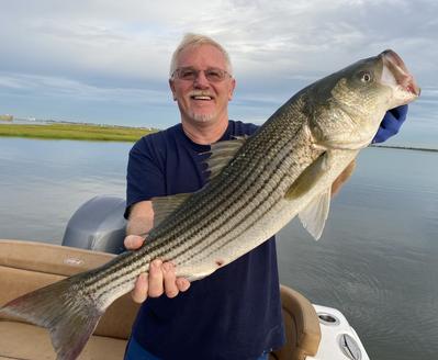 skinny water fishing for striped bass. www.bluedayzgear.com