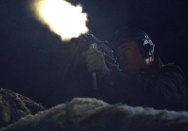 German Panzer commander firing MP-40