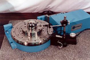 A Rotary Grinding Table analyzing the outside diameter of a manufactured component