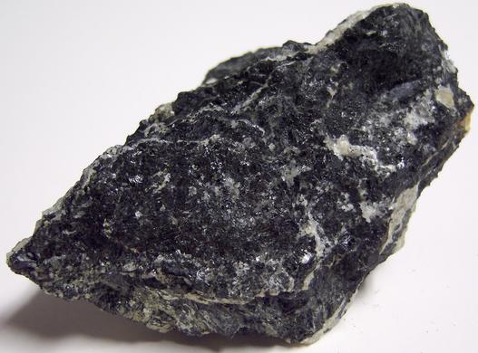 MAGNESIO-HORNBLENDE and fluorescent ALBITE, Philips Mine (Philips Pyrite Mine; Anthony's Nose Pyrrhotite Mine), Anthony's Nose, Philipstown Township, Putnam County, New York, USA