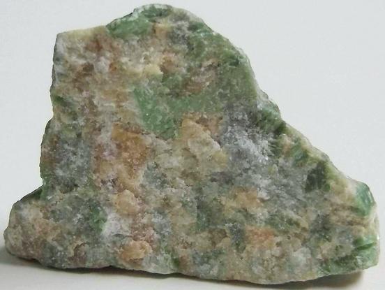 rodingite: green Cr Diopside, orange Grossular garnet, Hunting Hill quarry (Rockville Crushed Stone Quarry; Travilah Quarry; Rockville Quarry; Bardon Stone Quarry; Aggregate Industries Quarry), Rockville, Montgomery County, Maryland, USA