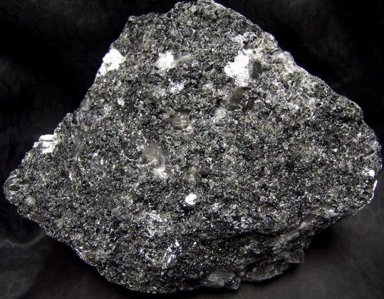 fluorescent WOLLASTONITE, GARNET, PYRITE, DIOPSIDE, black CALCITE - Sterling Mine, Sterling Hill, Ogdensburg, Franklin Mining District, Sussex County, New Jersey, USA