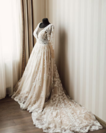 Sewing mannequin with a bridal gown.