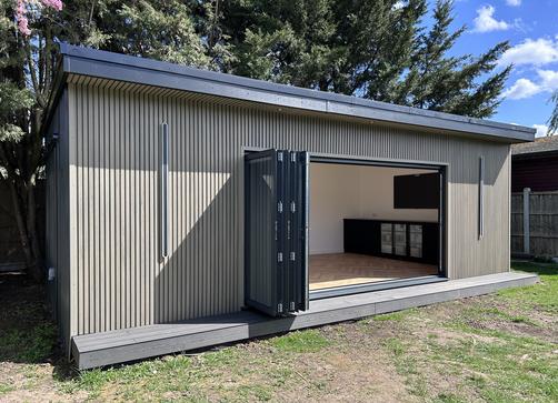 Large modern garden room with pool table and bar
