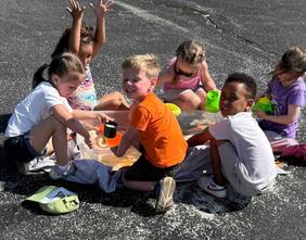 preschool students doing boat activity