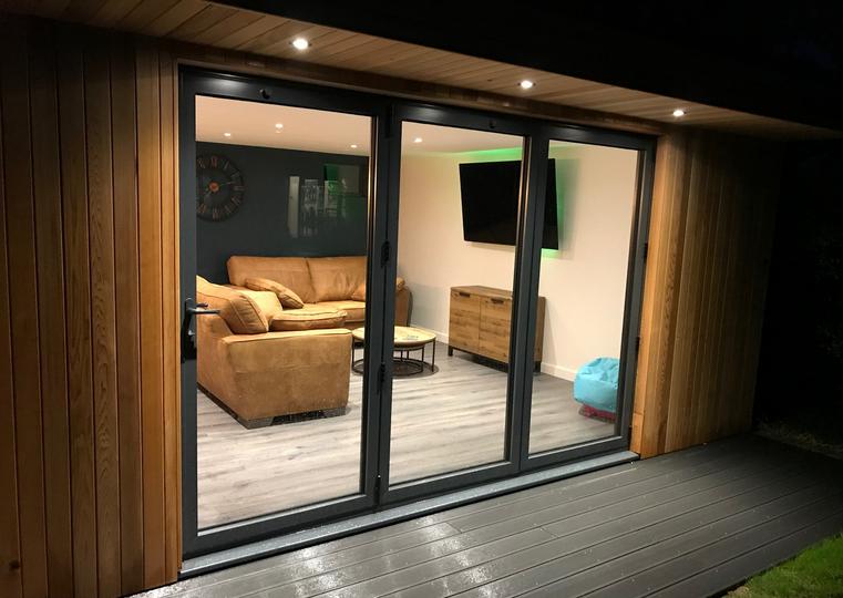 Modern cedar clad garden room with bespoke bar in Leigh-on-Sea, Essex built by Robertson Garden Rooms