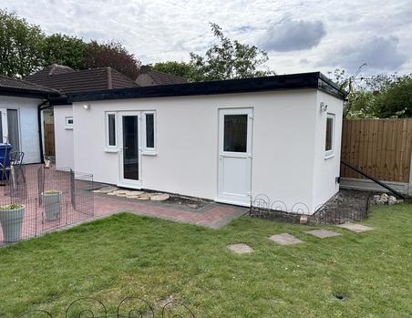 Garden room with rendered exterior