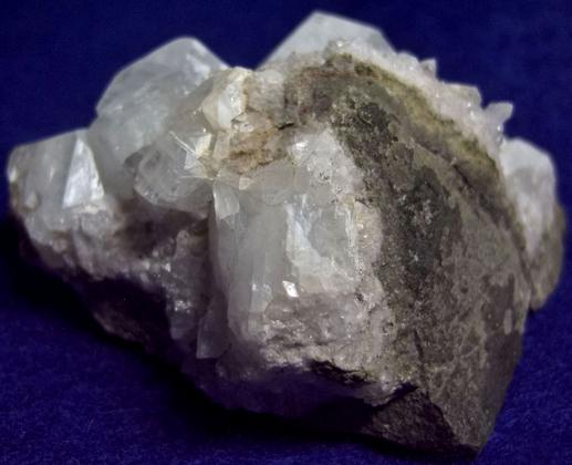 fluorescing FLUORAPOPHYLLITE, QUARTZ, LAUMONTITE - Prospect Park Quarry (Sowerbutt Quarry; Vandermade Quarry; Warren Brothers Quarry), Prospect Park, Passaic County, New Jersey, USA - ex Parker Minerals