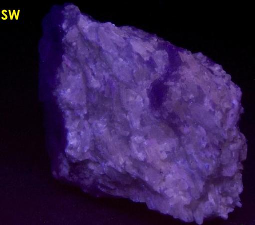fluorescent phosphorescent white Wollastonite, blue Calcite- Gouverneur Talc Company No. 4 Quarry (Valentine deposit), Harrisville, Diana Township, Lewis County, New York
